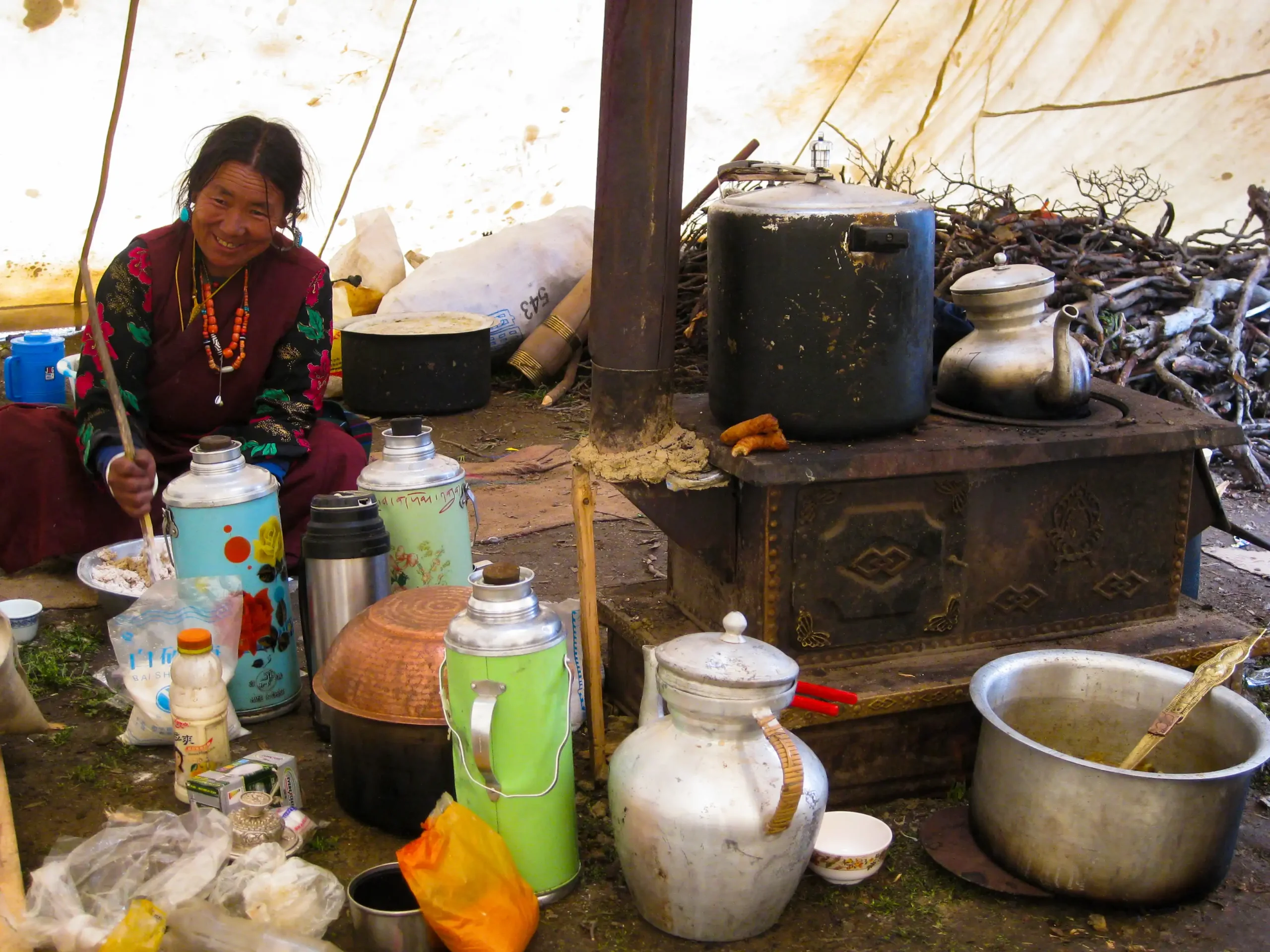 Local Dolpo woman smiling while working in Upper Dolpo, Nepal