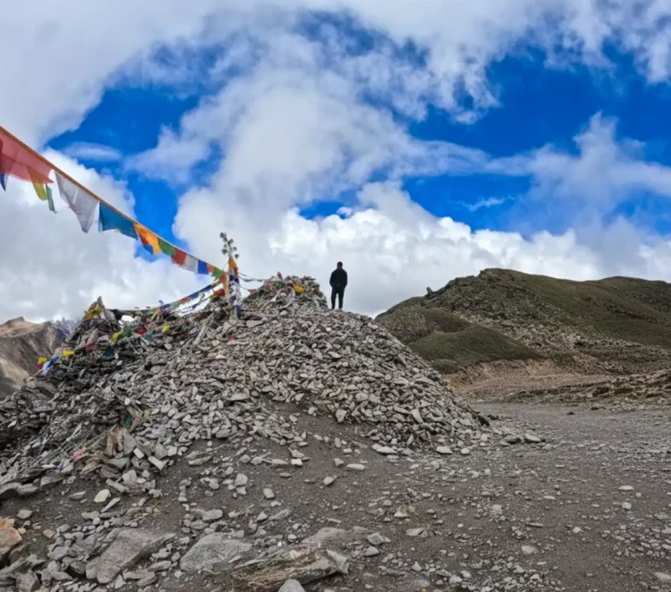 Nyalu La Pass 5000m highest point Humla Limi Valley Trek with distant Mt Kailash view