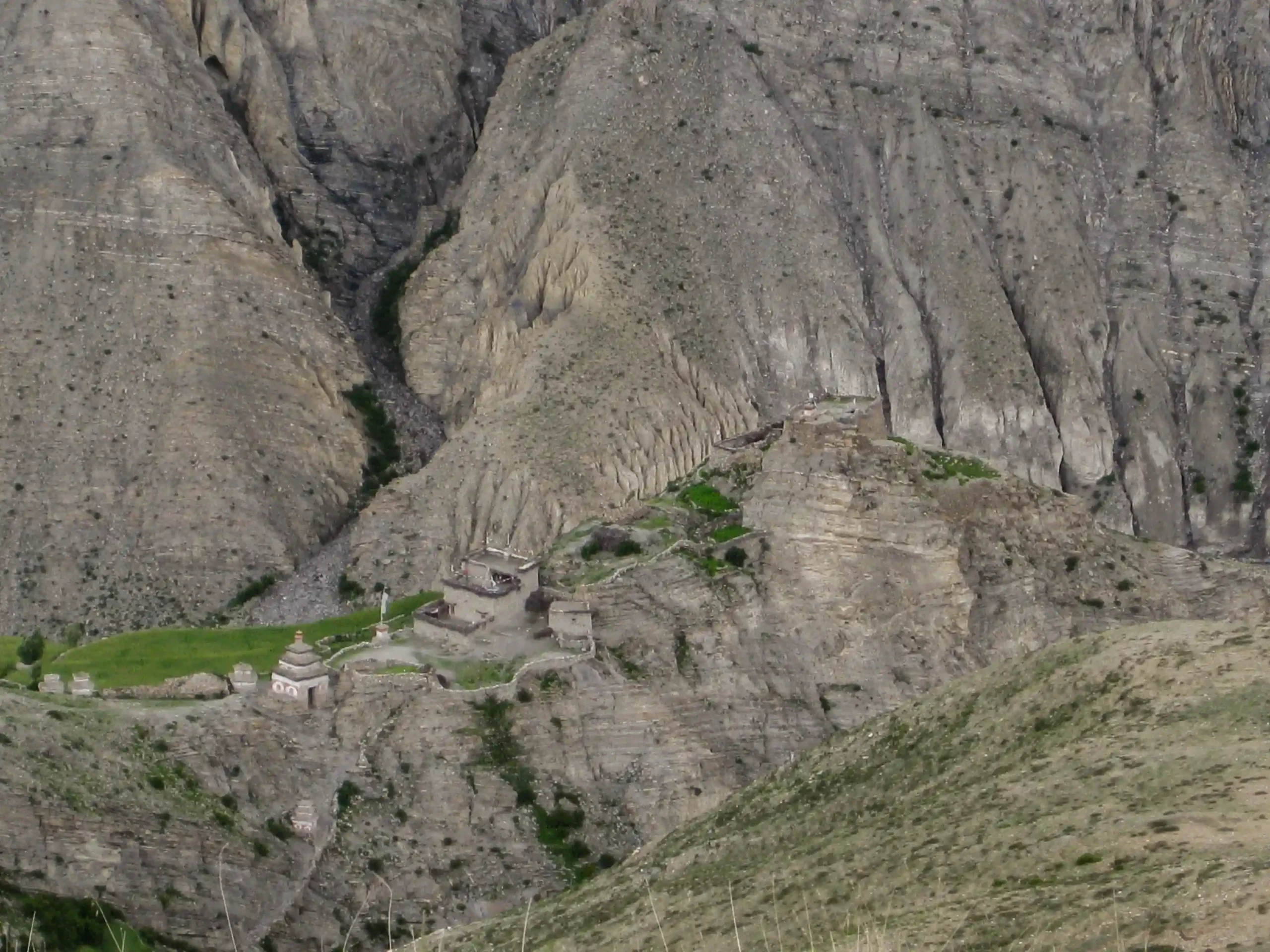 Traditional stone houses of Upper Dolpo village Nepal with mountain backdrop
